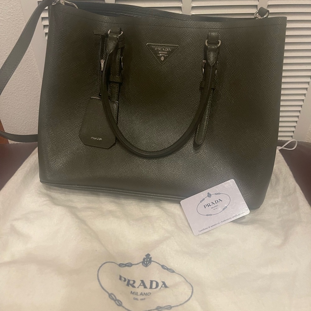 Green Prada hand bag.